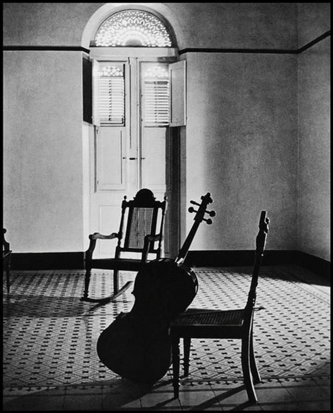 Cello next to a chair